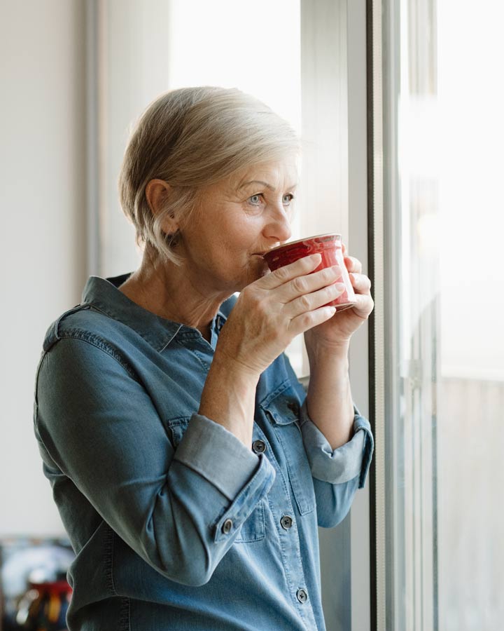 Older woman drinking coffee