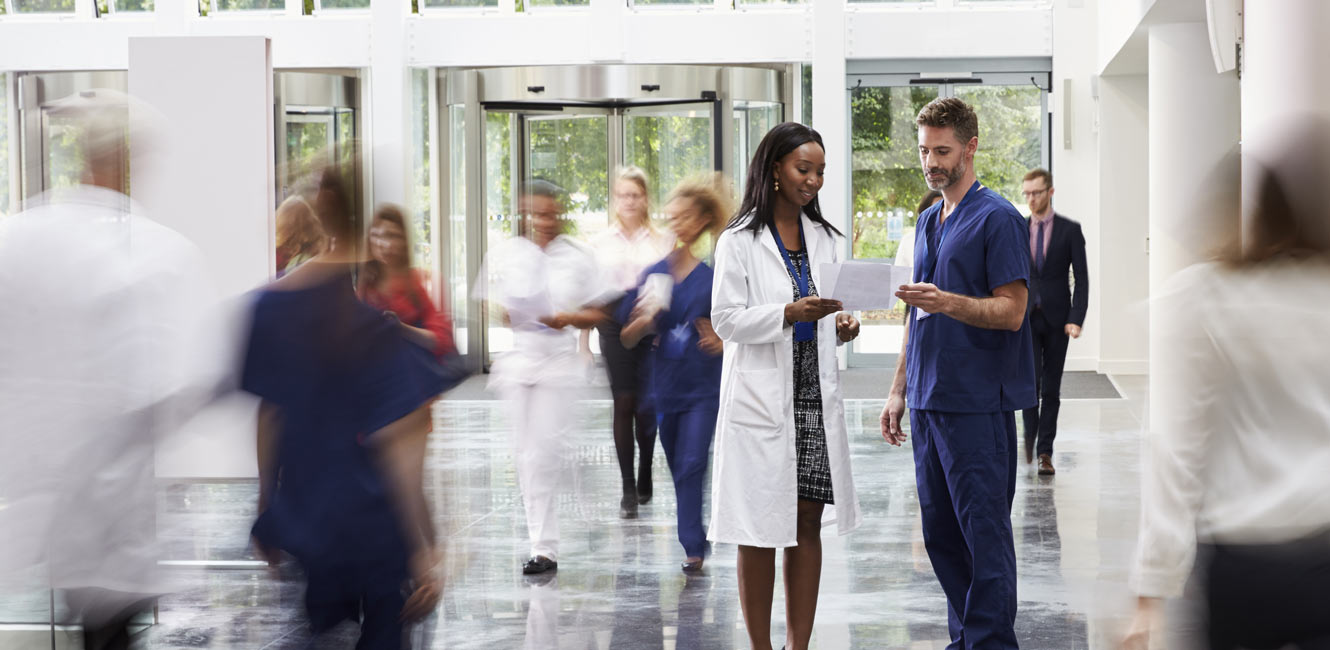 Doctor talking with nurse