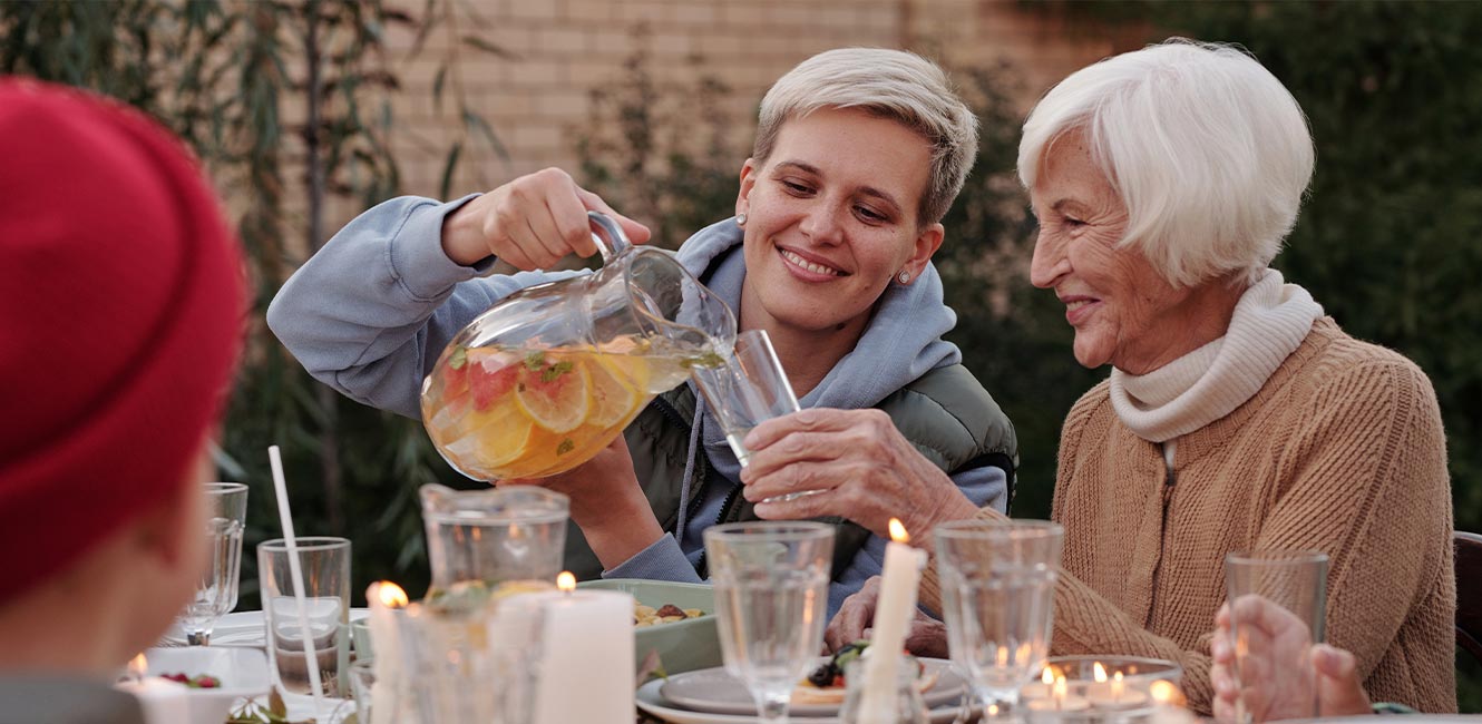 Intergenerational Family enjoying outdoor meal